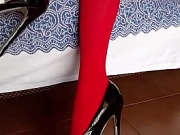 The milf with beautiful legs, red pantyhose and black heels